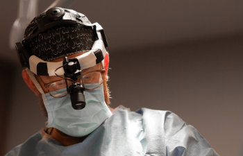 Dr. Peter Koltz performing plastic surgery.